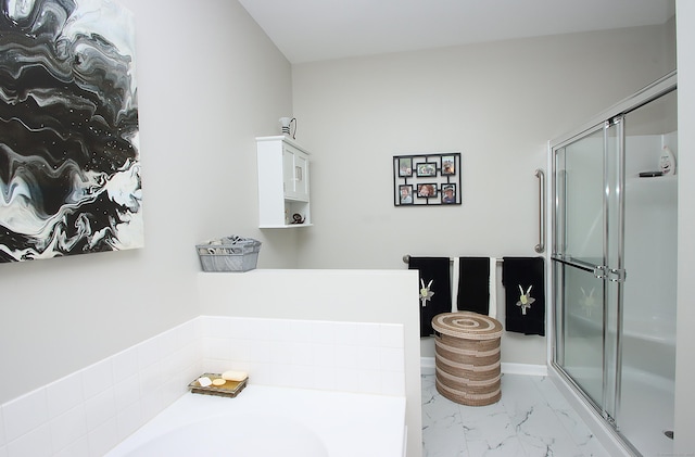 36 Todd St Unit 606, Hamden, CT 06518 - bathroom featuring a bath, a stall shower, and marble look tiles