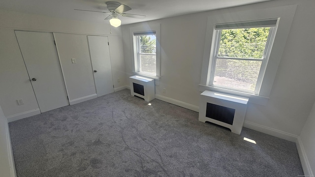 83 Mulberry St, Stamford, CT 06907 - unfurnished bedroom featuring carpet flooring, a closet, and a ceiling fan