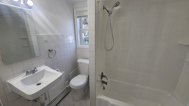 83 Mulberry St, Stamford, CT 06907 - bathroom with tile walls, baseboard heating, and shower / washtub combination