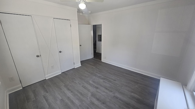 83 Mulberry St, Stamford, CT 06907 - unfurnished bedroom with dark wood-style floors, a closet, a ceiling fan, and crown molding