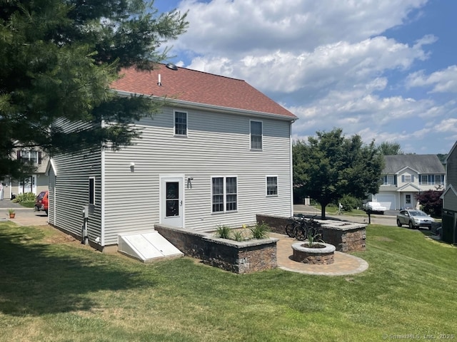 63 Lucy Cir, Wallingford, CT 06492 - rear view of property with a lawn