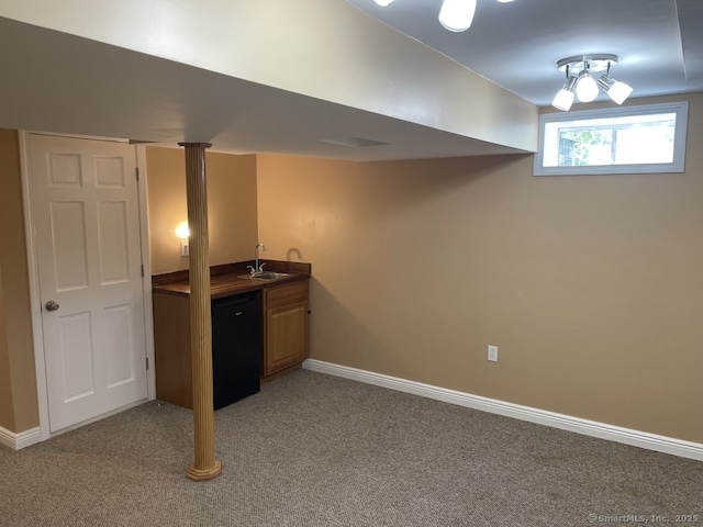 63 Lucy Cir, Wallingford, CT 06492 - basement with light colored carpet and bar with sink