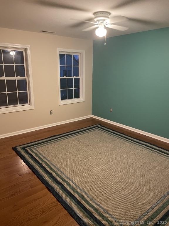 63 Lucy Cir, Wallingford, CT 06492 - unfurnished room featuring wood finished floors and a ceiling fan