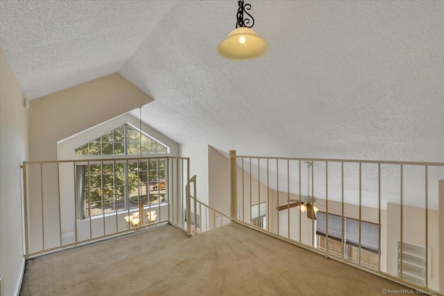49 Carriage Crossing Ln Unit 49, Middletown, CT 06457 - hallway with carpet, a textured ceiling, vaulted ceiling, and an upstairs landing