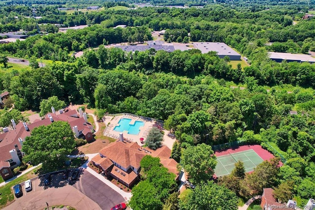 49 Carriage Crossing Ln Unit 49, Middletown, CT 06457 - aerial view of property and surrounding area with a pool area and a heavily wooded area