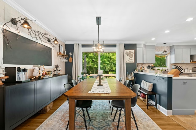 136 Knorr Rd, Monroe, CT 06468 - dining space with crown molding, light wood-style floors, a chandelier, and recessed lighting