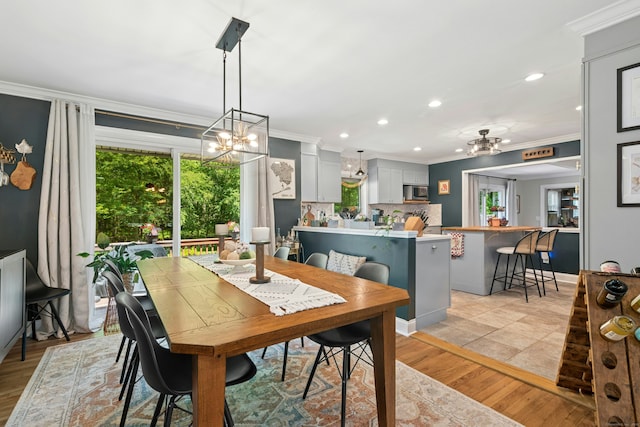 136 Knorr Rd, Monroe, CT 06468 - dining area featuring crown molding, a chandelier, light wood-style flooring, and recessed lighting