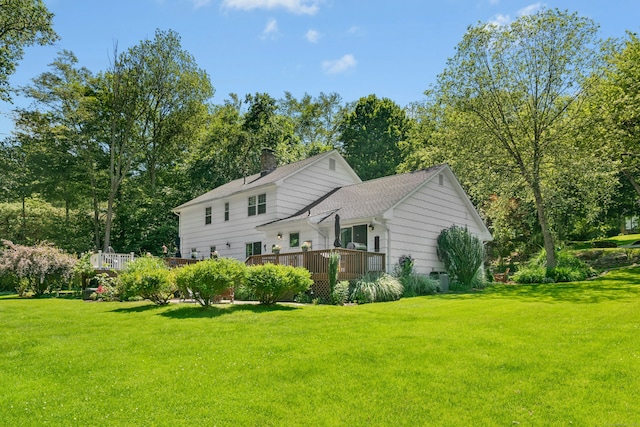 136 Knorr Rd, Monroe, CT 06468 - view of front of property featuring a wooden deck, a front yard, a chimney, and view of scattered trees