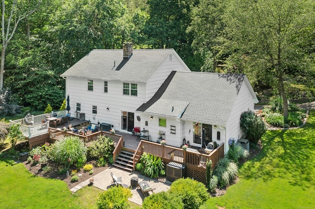 136 Knorr Rd, Monroe, CT 06468 - rear view of house featuring an outdoor living space, a chimney, a shingled roof, and a lawn