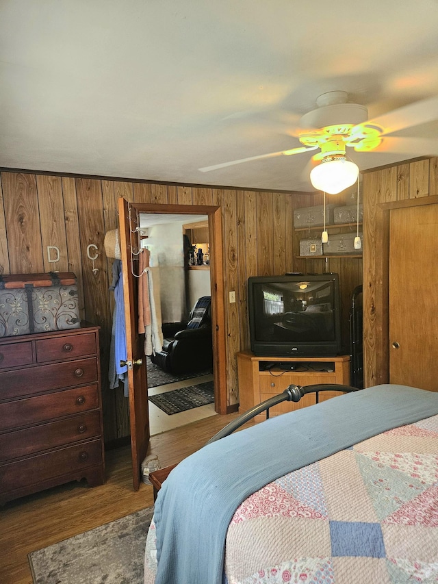 15 Ledge Rd, Lebanon, CT 06249 - bedroom with wood walls, wood finished floors, a ceiling fan, and a closet