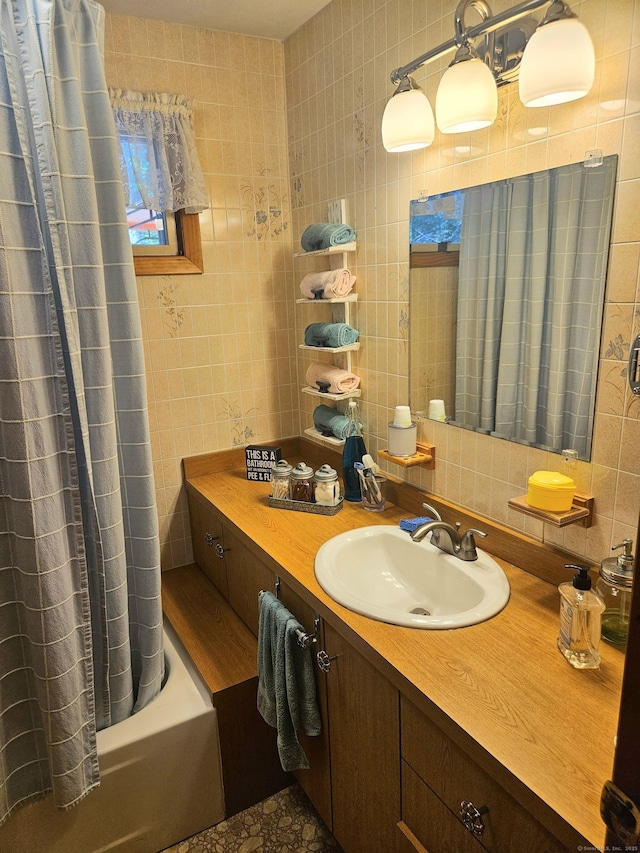 15 Ledge Rd, Lebanon, CT 06249 - bathroom with tile walls, vanity, shower / tub combo, and tasteful backsplash