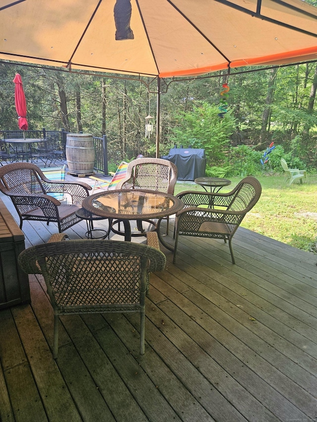 15 Ledge Rd, Lebanon, CT 06249 - wooden terrace with outdoor dining area, grilling area, an outdoor living space, and a gazebo