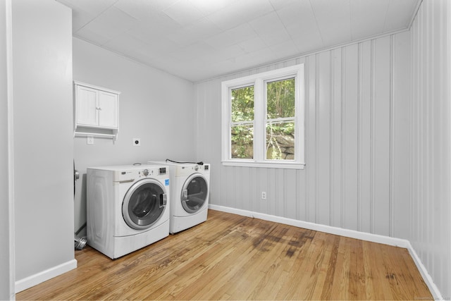 143 Jewett St, Ansonia, CT 06401 - laundry area with washing machine and dryer and light wood-style floors