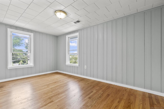 143 Jewett St, Ansonia, CT 06401 - unfurnished room featuring healthy amount of natural light and wood finished floors