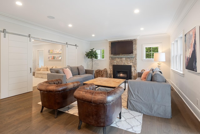 74 Brookside Rd, Darien, CT 06820 - living room with a barn door, wood finished floors, crown molding, a fireplace, and recessed lighting
