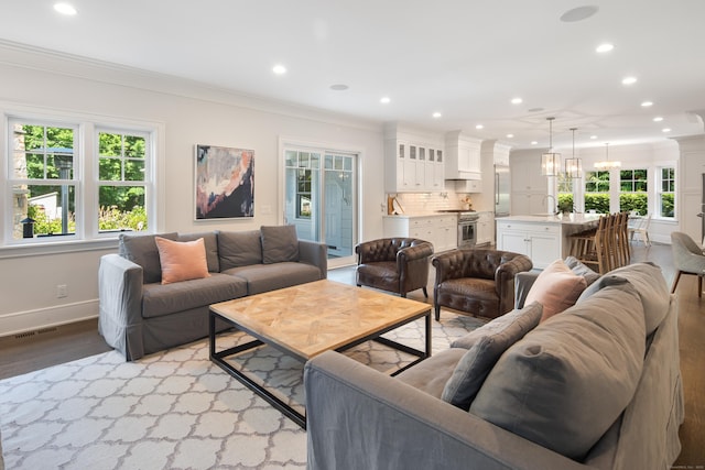 74 Brookside Rd, Darien, CT 06820 - living room with light wood finished floors, recessed lighting, and ornamental molding