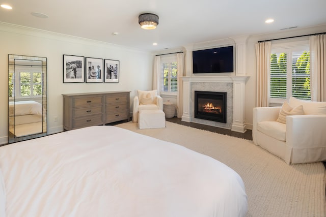 74 Brookside Rd, Darien, CT 06820 - carpeted bedroom with a glass covered fireplace, ornamental molding, and recessed lighting