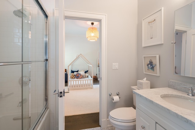 74 Brookside Rd, Darien, CT 06820 - full bathroom with connected bathroom, vanity, and combined bath / shower with glass door
