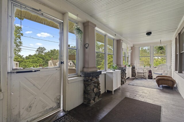 96 Melbourne Ter, Waterbury, CT 06704 - sunroom featuring wood-type flooring and plenty of natural light
