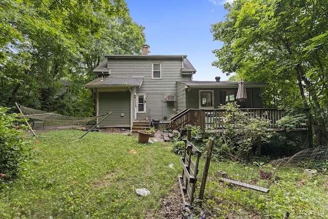 96 Melbourne Ter, Waterbury, CT 06704 - back of house with a chimney, a deck, a lawn, and roof with shingles