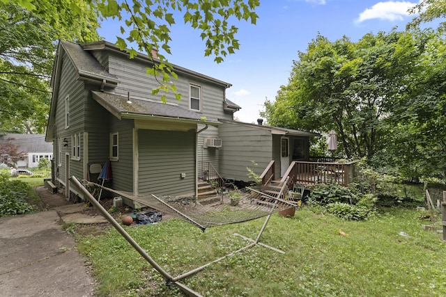 96 Melbourne Ter, Waterbury, CT 06704 - rear view of house featuring a deck, a yard, and a chimney