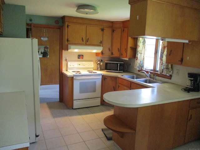 8 Susan Ln, Meriden, CT 06450 - kitchen with white appliances, under cabinet range hood, open shelves, light countertops, and a peninsula
