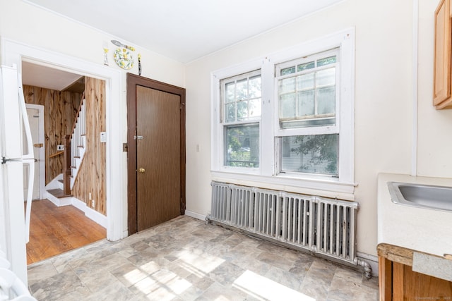 49 Richard Rd, East Hartford, CT 06119 - entryway with radiator, stone finish flooring, and stairs