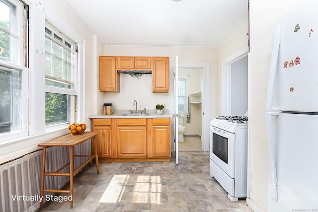 49 Richard Rd, East Hartford, CT 06119 - kitchen featuring white appliances, stone finish flooring, and light countertops