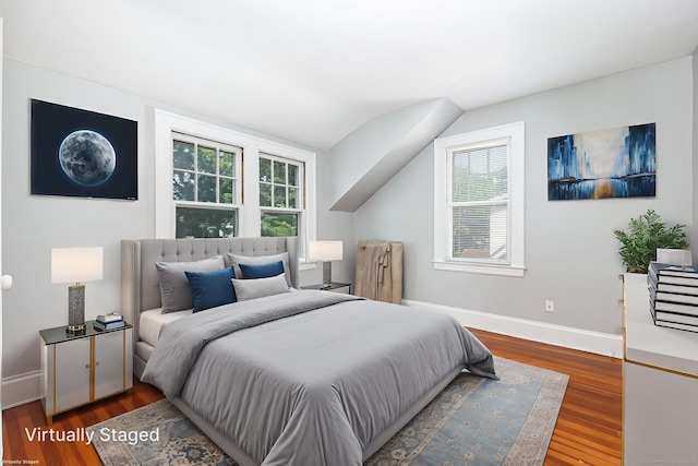 49 Richard Rd, East Hartford, CT 06119 - bedroom featuring multiple windows, wood finished floors, and vaulted ceiling