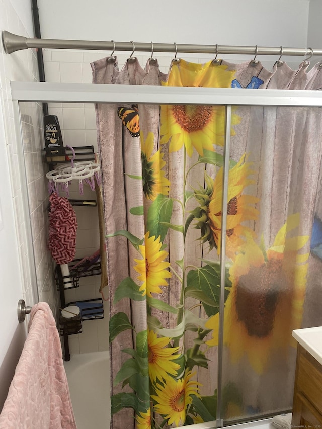 755 Wethersfield Ave Apt A5, Hartford, CT 06114 - full bathroom featuring vanity, shower / bath combo with shower curtain, and tile walls