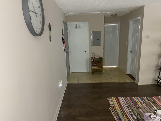755 Wethersfield Ave Apt A5, Hartford, CT 06114 - hallway with wood finished floors, electric panel, and a textured ceiling