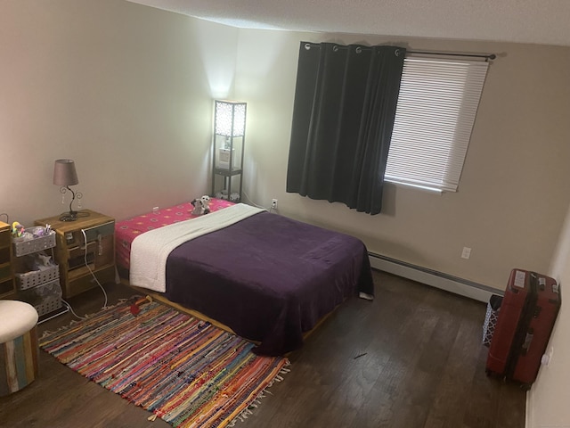 755 Wethersfield Ave Apt A5, Hartford, CT 06114 - bedroom with a baseboard heating unit and wood finished floors