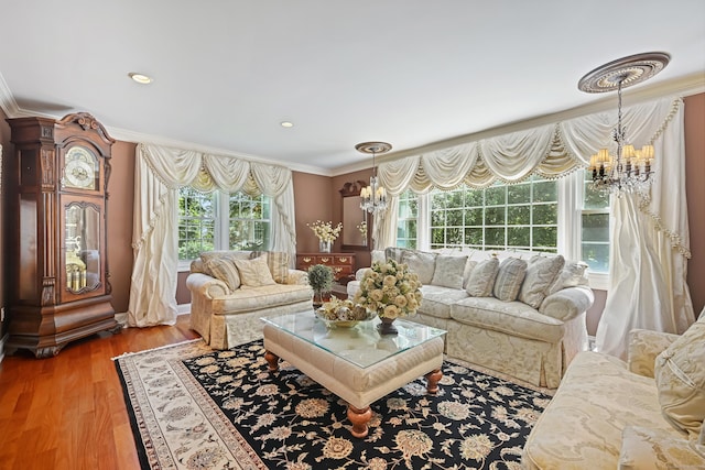 40 Hawley Rd, Danbury, CT 06811 - living room with a chandelier, ornamental molding, plenty of natural light, wood finished floors, and recessed lighting
