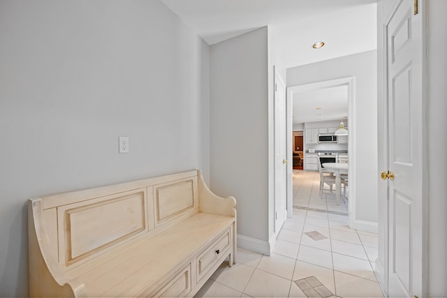 40 Hawley Rd, Danbury, CT 06811 - corridor with light tile patterned floors and baseboards