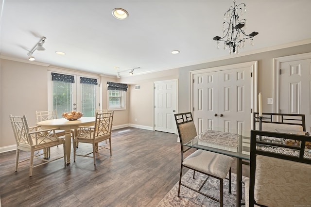 40 Hawley Rd, Danbury, CT 06811 - dining room with ornamental molding, track lighting, a chandelier, dark wood-type flooring, and recessed lighting