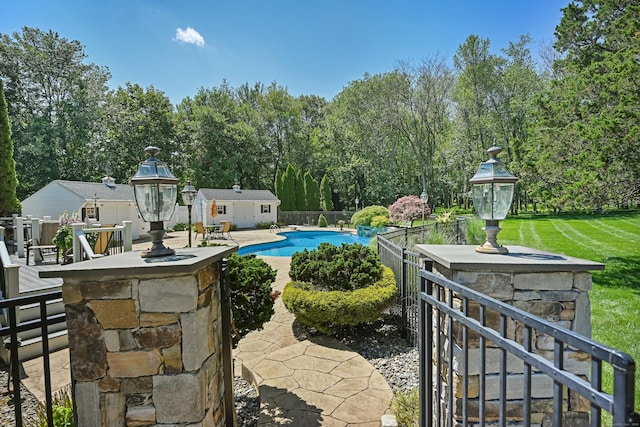 40 Hawley Rd, Danbury, CT 06811 - view of pool with an outdoor structure, view of scattered trees, and a patio area