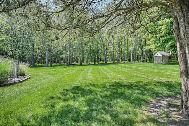 40 Hawley Rd, Danbury, CT 06811 - view of green lawn with a wooded view and an outdoor structure