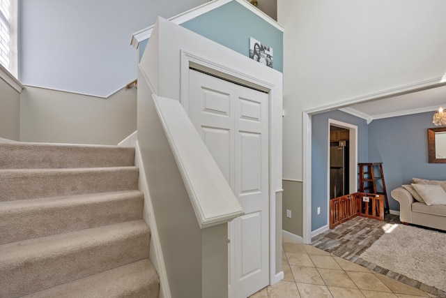 51 Schoolhouse Lndg Unit 51, East Granby, CT 06026 - stairs featuring tile patterned floors and ornamental molding