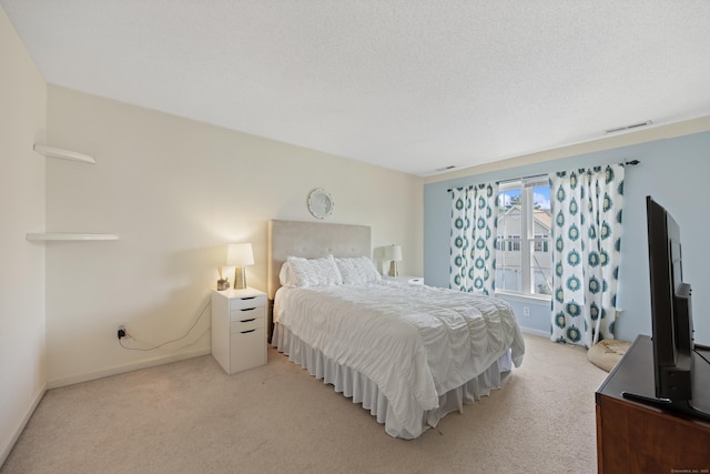 51 Schoolhouse Lndg Unit 51, East Granby, CT 06026 - bedroom with light carpet and baseboards