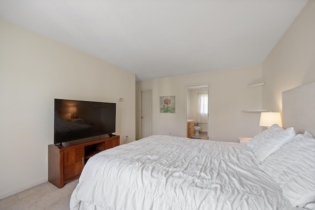 51 Schoolhouse Lndg Unit 51, East Granby, CT 06026 - bedroom with light colored carpet and connected bathroom