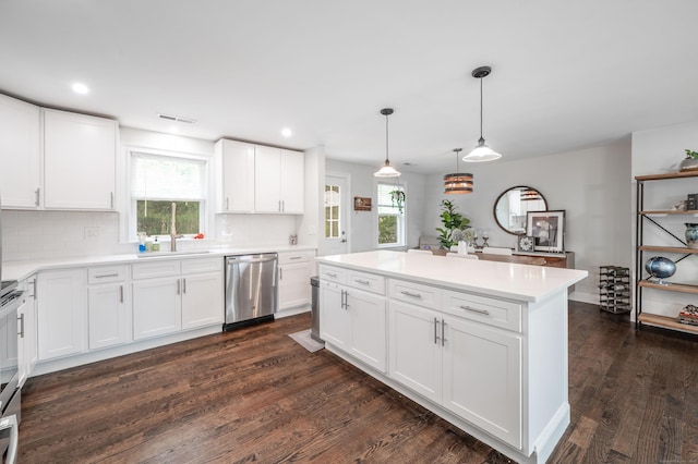 51 Mountain View Dr, Brookfield, CT 06804 - kitchen featuring appliances with stainless steel finishes, plenty of natural light, dark wood-style flooring, light countertops, and recessed lighting