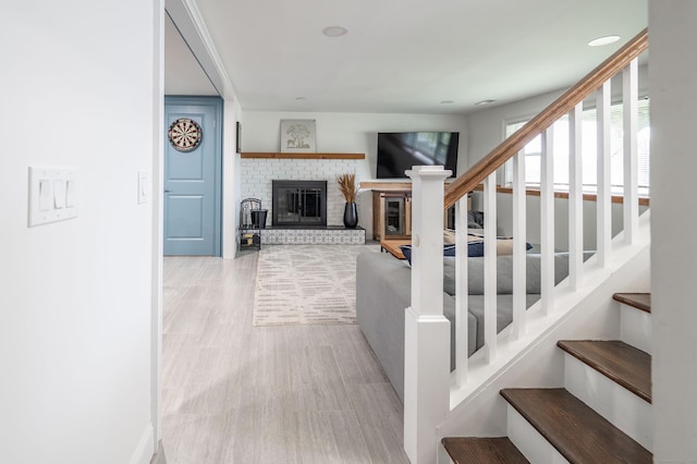 51 Mountain View Dr, Brookfield, CT 06804 - staircase featuring a brick fireplace
