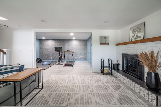 51 Mountain View Dr, Brookfield, CT 06804 - exercise room featuring a fireplace and wood finished floors