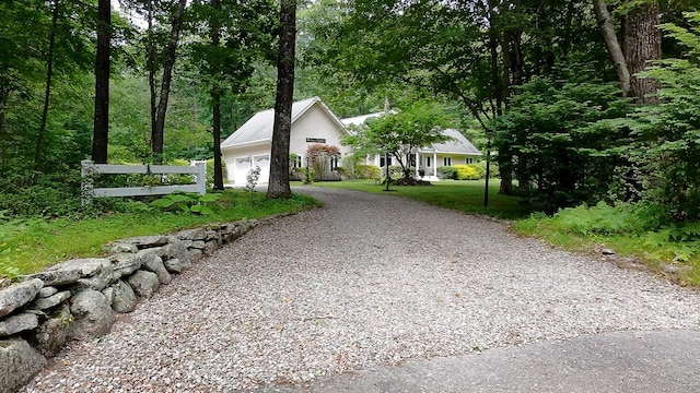 115 Center Rd, Woodstock, CT 06281 - view of front of house featuring gravel driveway and a garage