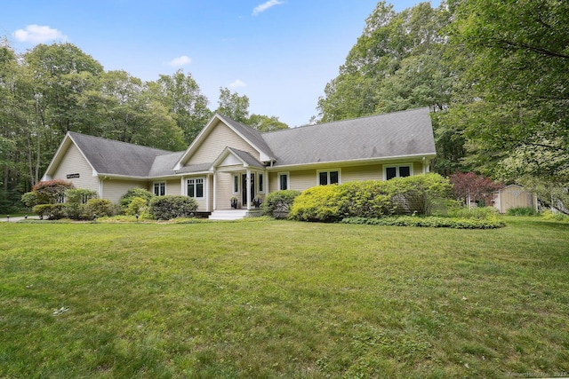 115 Center Rd, Woodstock, CT 06281 - ranch-style home with a front lawn and a storage unit