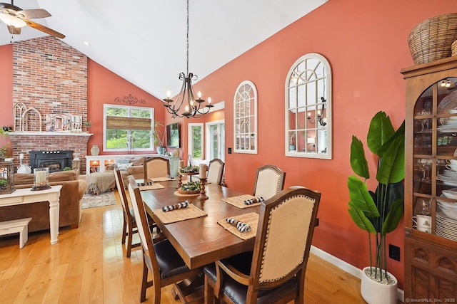 115 Center Rd, Woodstock, CT 06281 - dining area featuring high vaulted ceiling, ceiling fan, light wood finished floors, and a chandelier