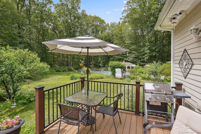 115 Center Rd, Woodstock, CT 06281 - wooden terrace featuring outdoor dining area, area for grilling, a lawn, and a pool