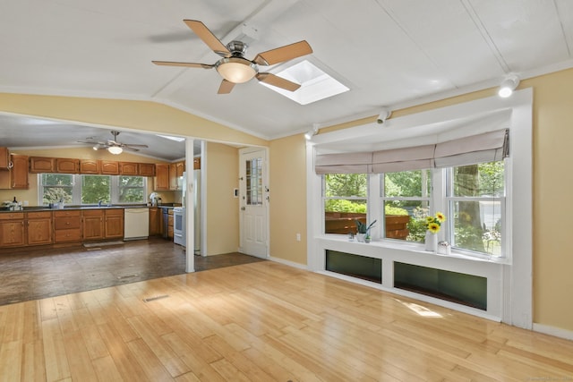 28 Nashua St, Norwich, CT 06360 - unfurnished living room featuring ceiling fan, a skylight, hardwood / wood-style floors, lofted ceiling, and crown molding