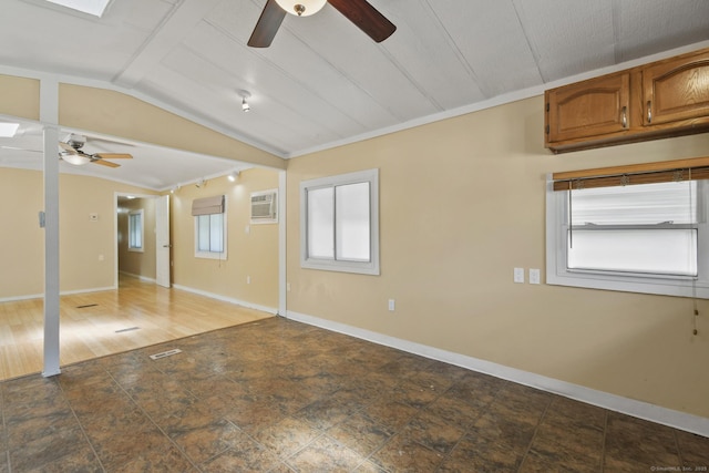 28 Nashua St, Norwich, CT 06360 - unfurnished bedroom with lofted ceiling, multiple windows, and an AC wall unit