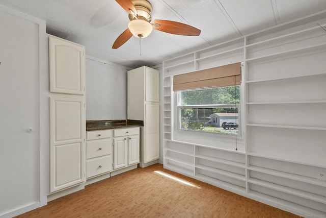 28 Nashua St, Norwich, CT 06360 - bar area featuring light wood-type flooring and a ceiling fan